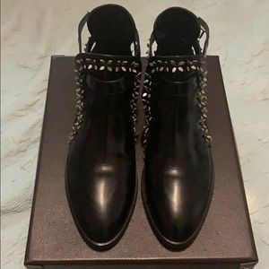 Alaia Appliqué Noir Cutout Ankle Booties